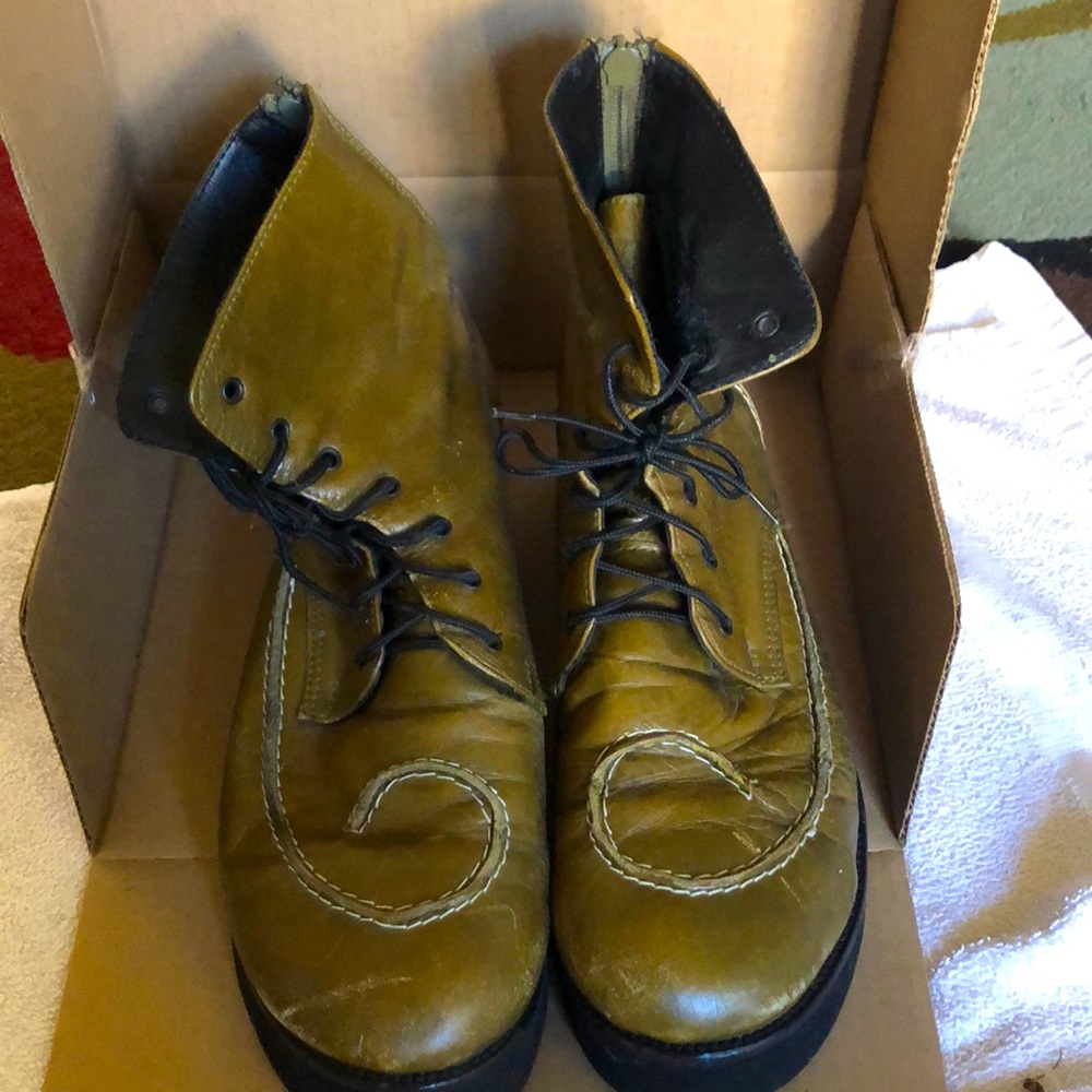 Sage green platform booties with distressed ornamentation stitching